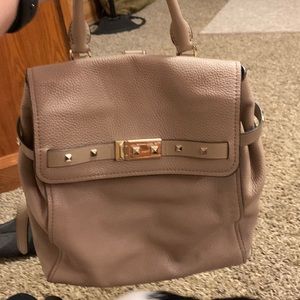 Michael Kors backpack/purse. BRAND NEW. NEVER USED. Light grey color. No damage!